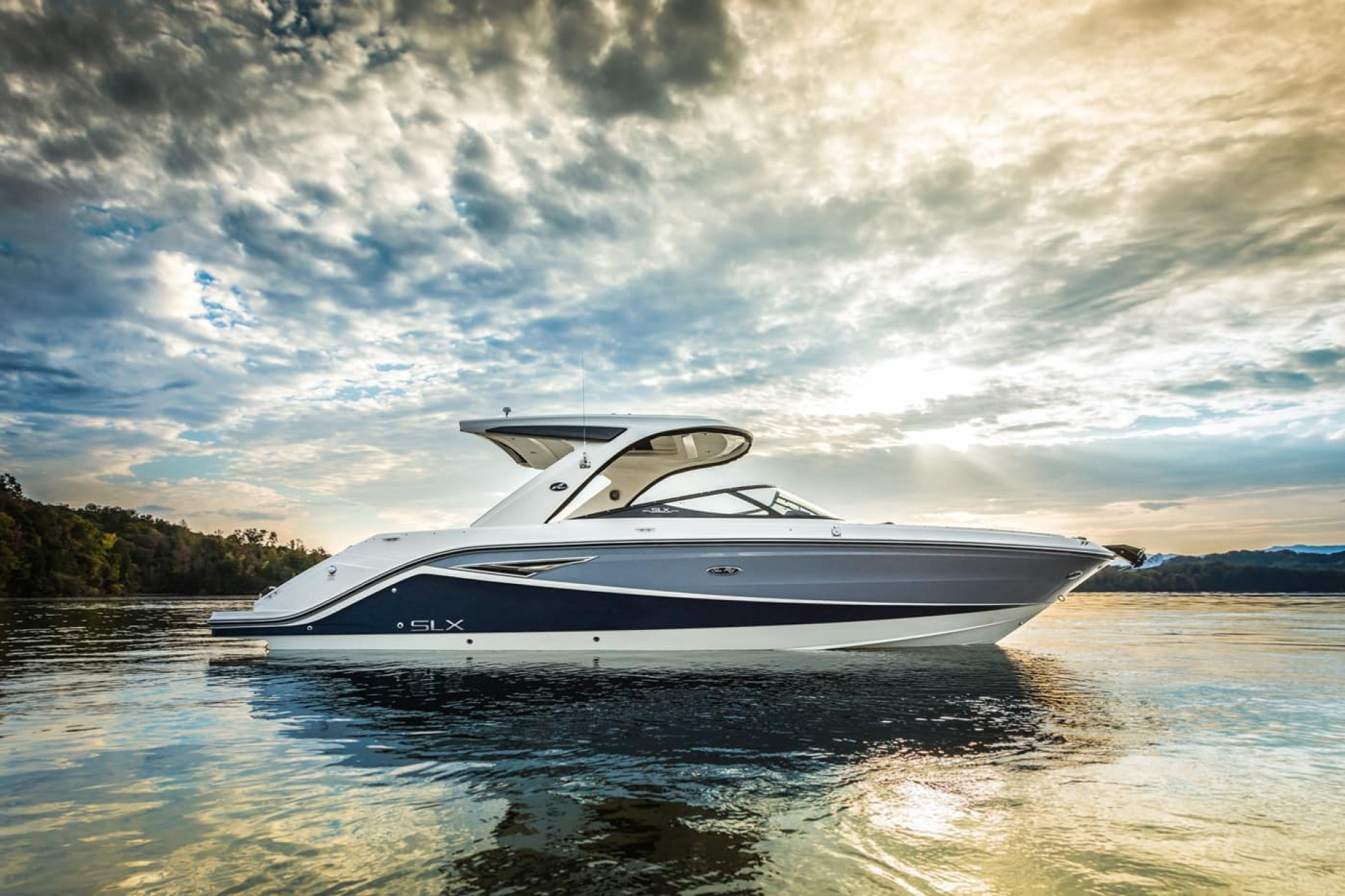 THIS NEW 26-FOOT SPORT BOAT WAS DESIGNED BY YACHTING'S FIRST ALL